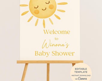 May include: A welcome sign for a baby shower with a yellow sun illustration and the text "Welcome to Winona's Baby Shower". The sign is on a wooden easel. The text "Editable Template Instant Download via Canva" is in a circle at the bottom of the sign.
