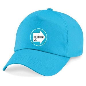 May include: A vibrant turquoise baseball cap with a curved peak. The cap displays a white circular emblem with the text "REFORM UK" and a right-pointing arrow. The cap is made of a soft material and has a structured crown.