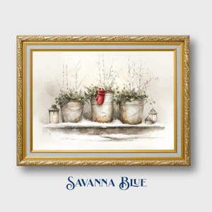 May include: Watercolor painting in a gold frame featuring three metal buckets with winter greenery and birch branches. A small red mitten is in the center bucket. Two lanterns flank the buckets. The text "SAVANNA BLUE" is at the bottom.