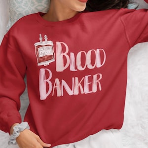 Lab Week Blood Banker Sweatshirt: Unisex Medical Humor Gift for Healthcare Workers