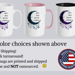 May include: Three 11-ounce ceramic mugs with a crescent moon design featuring a galaxy print and the text "Don't mess with my energy". The mugs are available in white, pink, and black.