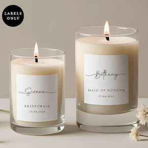 Personalised bridesmaid proposal candle labels on small glass candles with elegant white matte square stickers, minimalist wedding favour candles in neutral bridal styling