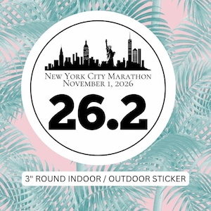 May include: A 3-inch round indoor and outdoor sticker featuring a black silhouette of the New York City skyline, including the Statue of Liberty. The text reads New York City Marathon November 1, 2026, with the large black numbers 26.2 below.