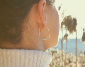Minimalist gold and silver earrings