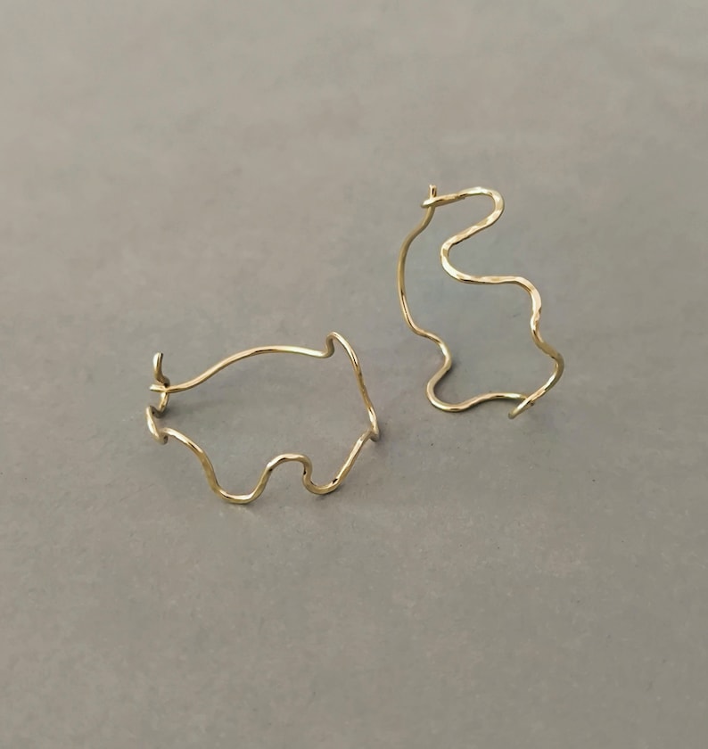 14k laminated gold snake hoop earrings image 1