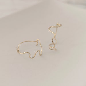 14k laminated gold snake hoop earrings image 6