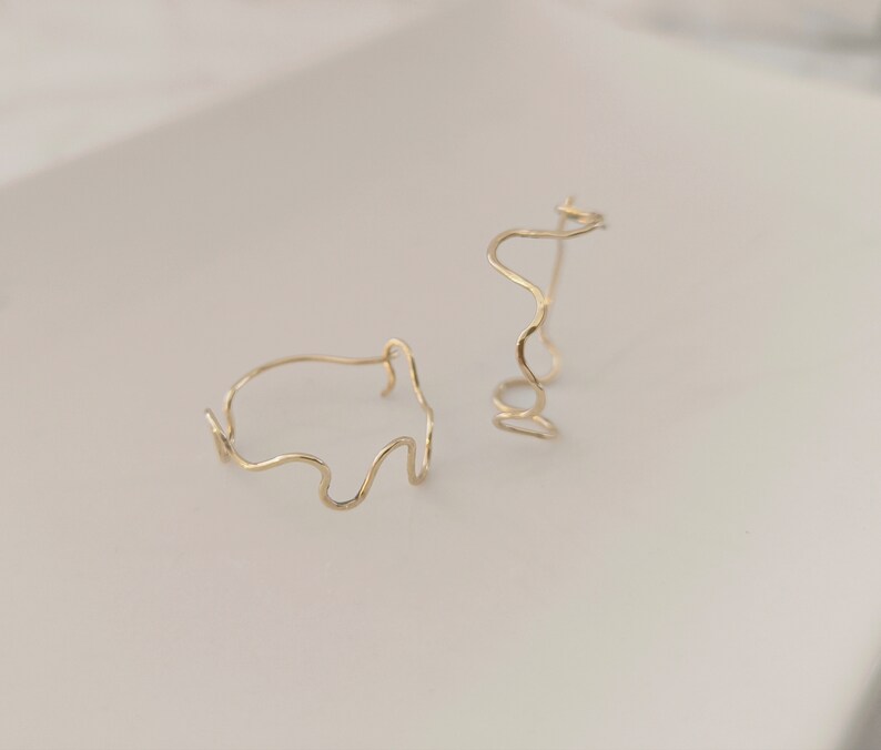 14k laminated gold snake hoop earrings image 6