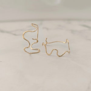 14k laminated gold snake hoop earrings image 2