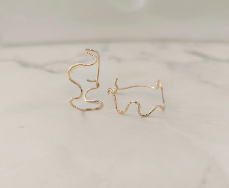 14k laminated gold snake hoop earrings image 2