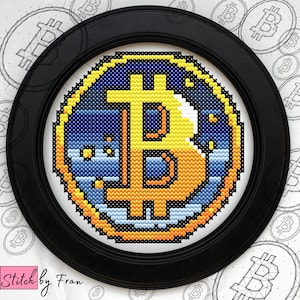 May include: A framed cross-stitch of a Bitcoin logo. The logo is yellow and orange with a blue and white background. The frame is black.