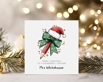 May include: A square Christmas card with a watercolor illustration of a pencil wearing a Santa hat and a green bow. The card reads "Merry Christmas to a Wonderful Teacher" and "Mrs Whitehouse".