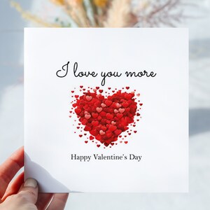 Valentinskarte Ich liebe dich mehr. Rotes Herz Minimal Stil. Glückwunschkarte. Innen blanko. Personalisierte Nachricht. Inklusive Kraftpapier Umschlag.