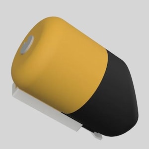 Puede incluir: Objeto cilíndrico amarillo y negro con un detalle plateado en la parte superior, fijado a una base rectangular blanca. El objeto está sobre un fondo gris liso. El diseño es simple y moderno.