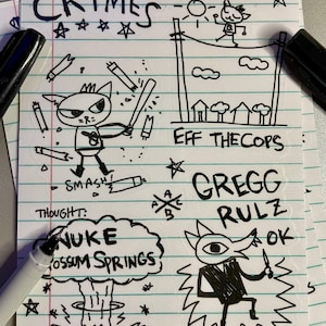 May include: A hand-drawn illustration on lined paper with cartoon images and text. The word "CRIMES" is at the top, and other phrases include "EFF THE COPS" and "GREGG RULZ." The drawings depict characters and scenes, with a distinct, illustrative style.