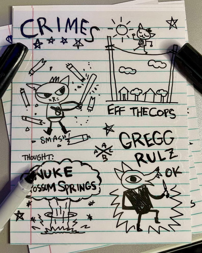 May include: A hand-drawn illustration on lined paper with cartoon images and text. The word "CRIMES" is at the top, and other phrases include "EFF THE COPS" and "GREGG RULZ." The drawings depict characters and scenes, with a distinct, illustrative style.