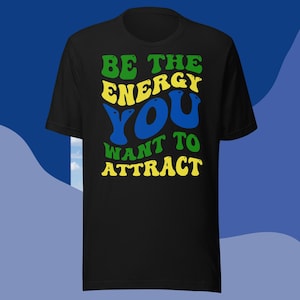 Sei die Energie, die du anziehen willst Unisex T-Shirt