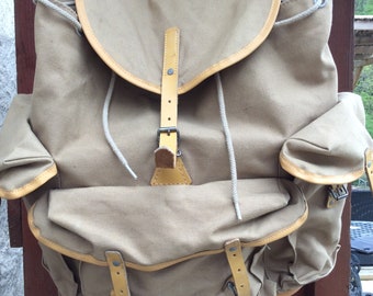 Lafuma French vintage 1960s canvas leather rucksack backpack steel support, internal cord closure, felt lined back straps, waterproof base