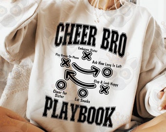 Puede incluir: Sudadera blanca con texto negro que dice "Cheer Bro" y un diagrama con instrucciones para animar a una hermana. El diagrama incluye instrucciones como "Play Game On Phone", "Embarrass Sister", "Ask How Long Is Left", "Clap & Look Happy", "Cheer for Sister" y "Eat Snacks".