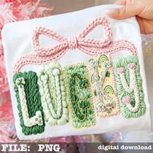 May include: White fabric with the name "LUCKY" embroidered in green, cream, and yellow thread. A pink knitted bow is at the top. The letters have various designs, including shamrocks, rainbows, and hearts. The bottom of the image has the text "FILE: PNG" and "digital download".