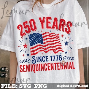 May include: White t-shirt with a patriotic design celebrating 250 years since 1776. The design features the American flag, the text "250 YEARS" in red, and "SINCE 1776 SEMIQUICENTENNIAL" in blue and red.