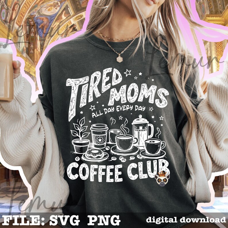 May include: Dark grey sweatshirt featuring the words "Tired Moms Coffee Club" in white. The design includes coffee cups, a coffee pot, a plant, and a donut. The words "All Day Every Day" are also included in the design.