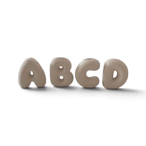 May include: A set of four individual, three-dimensional letters A, B, C, and D, crafted in a smooth, matte, light beige material. Each letter features a rounded, inflated, bubble-like shape with soft edges and a solid, uniform colour throughout.