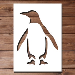 May include: A white silhouette of a penguin with a simple design. The penguin is facing forward with its wings outstretched and its feet together.