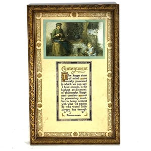 May include: A framed print featuring a detailed illustration of a woman and child in a kitchen setting. The print includes the word "Contentment" and a quote about happiness. The frame is ornate with a gold finish.