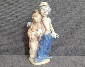 リヤドロのフィギュア「Pals Forever」ピエロと犬たちと少女 1999年