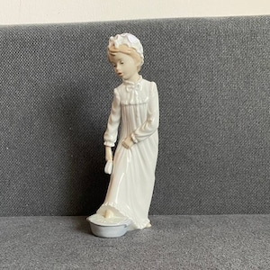 Nao by Lladro &quot;Boy Washing Feet&quot;