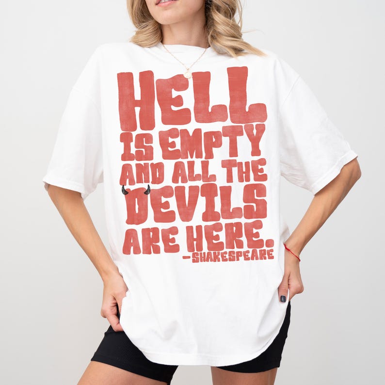 May include: White t-shirt with the quote "Hell is empty and all the devils are here" in red block letters. The quote includes a small devil graphic and is attributed to Shakespeare.
