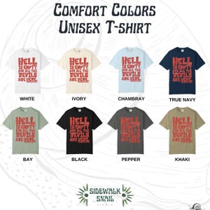 May include: A collection of Comfort Colors unisex t-shirts in various colors, including white, ivory, and black. Each shirt features the text "Hell is Empty and All the Devils Are Here" in red. The image also displays the Sidewalk Snail Studio logo.