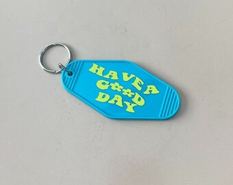 Turquoise Motel Keychain - "Have a Good Day" in Yellow Vinyl