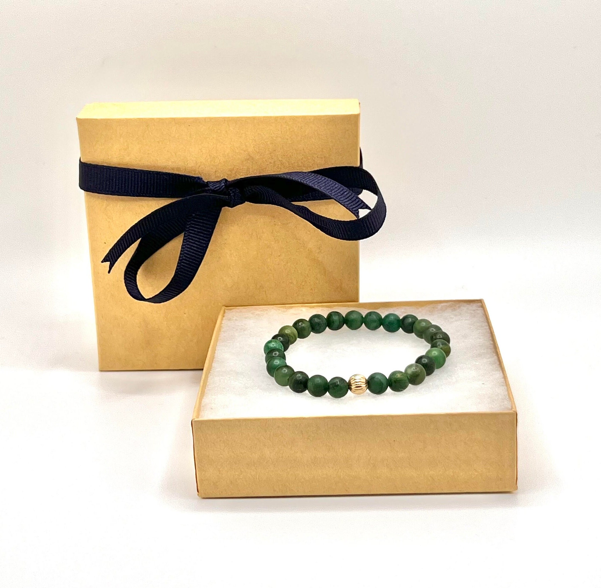 Bracciale elastico con perline rotonde in nefrite naturale Bracciale elastico con perline rotonde in nefrite naturale