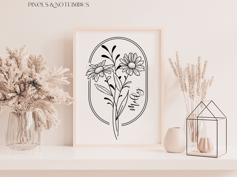 May include: Black and white line art print of three daisies in an oval frame with the name "Molly" written inside the frame.