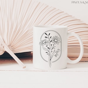 May include: White ceramic mug featuring a black outline of flowers and the word "Molly" within an oval.