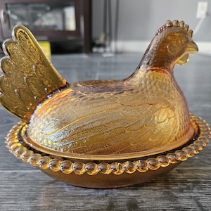Vintage glazen Indiana kip kip op nest amberoranje schaal