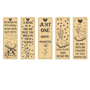 May include: Set of five wooden bookmarks with engraved designs and text. Each bookmark features a heart, floral accents, and phrases like "Reading is dreaming" and "Do not disturb unless you have chocolate."