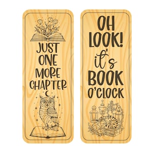 May include: Two wooden bookmarks with a light wood grain pattern. One bookmark features an owl illustration with the text "JUST ONE MORE CHAPTER". The other bookmark has a cat illustration with the text "OH LOOK! it's BOOK O'CLOCK".