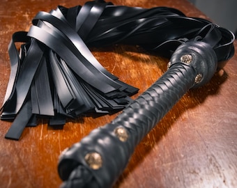 Flogger de goma de látex