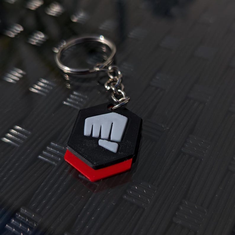 Valorant Riot Gun Buddy Schlüsselanhänger | Gaming-Anhänger – Geschenk & Fanartikel für Valorant-Spieler