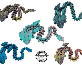 May include: Five 3D printed dragon figurines in different colors, including teal, blue, pink, and green. The dragons are posed in a curled up position with their tails curled around their bodies. The figurines are made of a smooth, plastic-like material.
