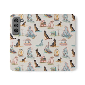 May include: A rectangular phone case with a light beige background featuring a repeating pattern of German Shepherd dogs interspersed with amusement park elements including roller coasters, a Ferris wheel, a carousel, and concession stands.