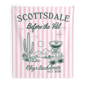 May include: Pink and white striped wall hanging with a green illustration of a cactus, mountains, and a cocktail glass. Text reads "SCOTTSDALE Before the Veil" and "Riley's Bachelorette MAY 2026".
