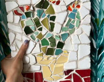 Ceramic tile mosaic of a cactus houseplant still life