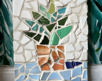 Ceramic tile mosaic of a succulent houseplant still life