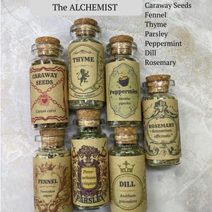May include: Seven clear glass jars with cork stoppers containing dried herbs and seeds. Labels read: VIRGO inspired collection, The ALCHEMIST, Caraway Seeds, Thyme, Peppermint, Fennel, Parsley, Dill, and Rosemary. Each label features unique illustrations.