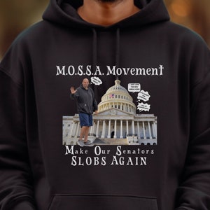 May include: Black hooded sweatshirt with a white graphic print of a man standing in front of the US Capitol building. The text on the graphic reads "M.O.S.S.A. Movement" and "Make Our Senators SLOBS AGAIN".