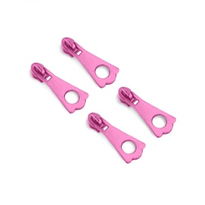 May include: Four pink zipper pulls with a decorative scalloped edge. Each pull has a round hole in the center.