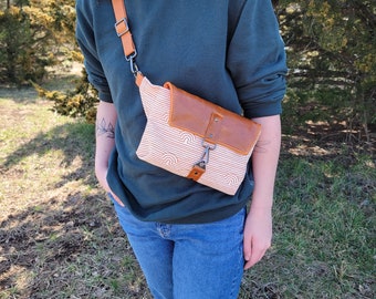 Haralson Crossbody in Ruby Star Society Rashida Coleman-Hale Linear Caves - Saddle + Leather